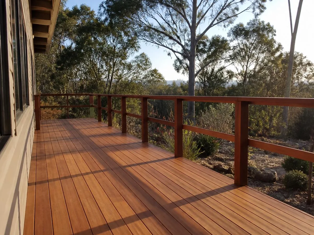 Newly built hardwood timber deck with balustrade overlooking native bushland