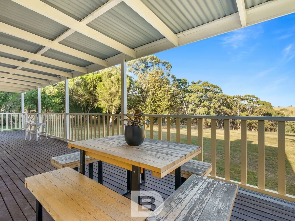 Lauriston verandah and deck area — rural residential home with restored decking and painted finishes by BMR