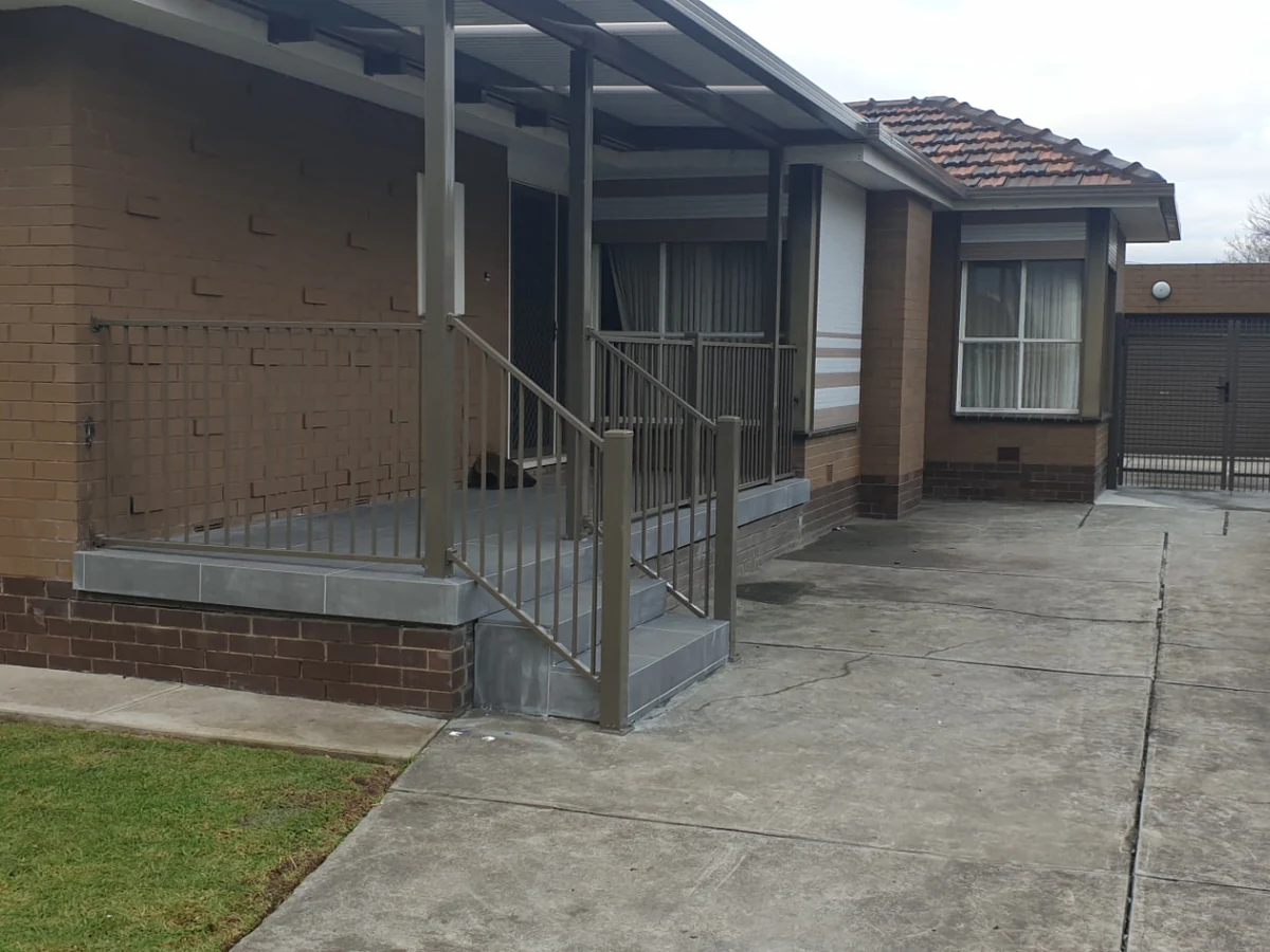 Completed residential metal balustrade, front steps, fencing and driveway gate in Bendigo